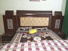 Double Bed with two side tables and Showcase