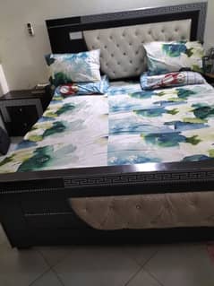 Bed with mattress and dressing