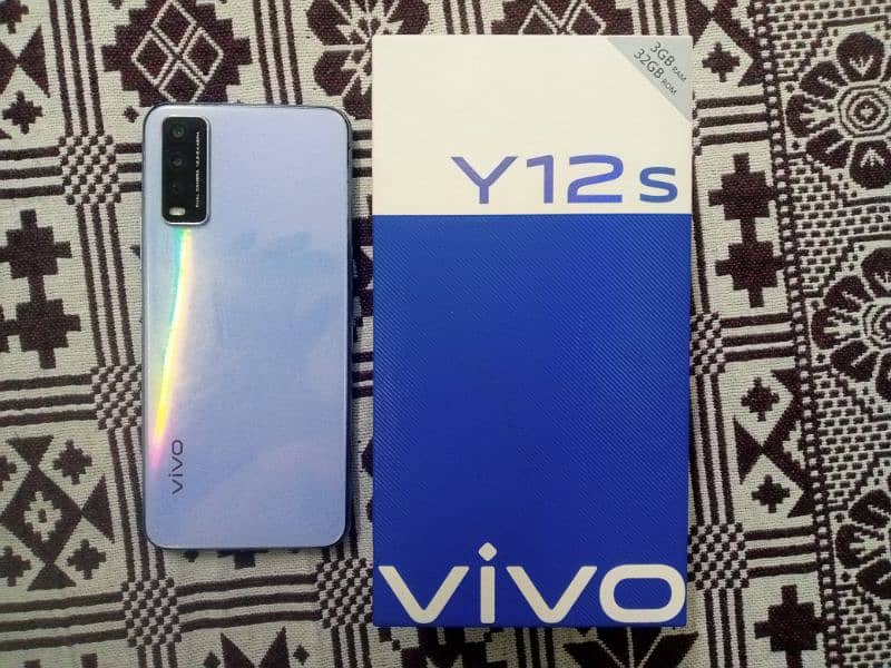 vivo y12s with box and infinix charger 3/32 GB 6