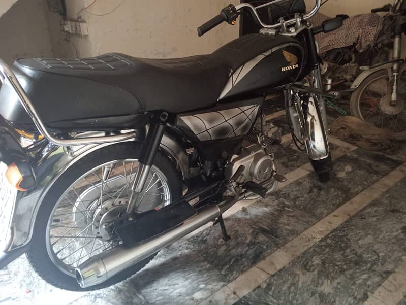 Honda CD 70 2024 4