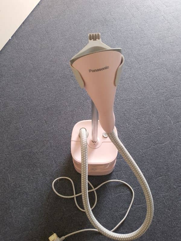 Panasonic garment steamer pink. 03408318776 1