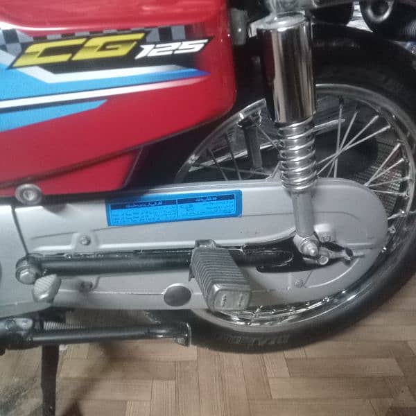 Honda 125 Karachi number excellent and original condition everything 11