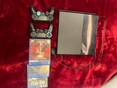 PS4 500gb with 2 controllers nd 3 games