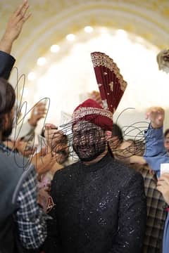 black sherwani with stones work