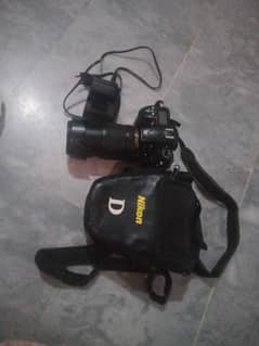 d7000 nikon with lens in good condition