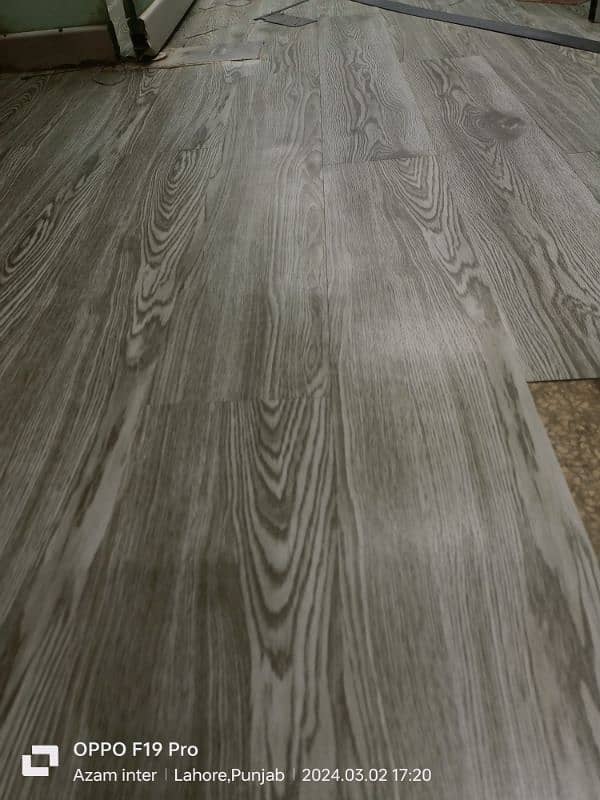 Chinese vinyl flooring tiles wooden texture PVC tiles wood floor 0