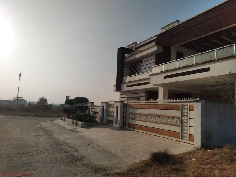 1 Kanal Double Unit House Available. For Sale in Gulshan e Sehat E-18 Islamabad 9