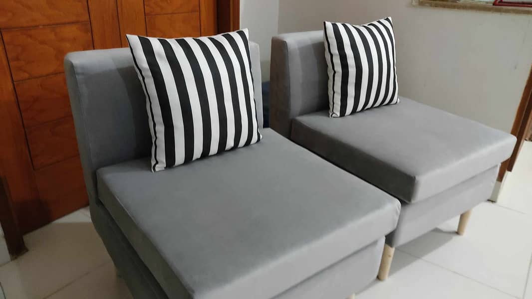 2 single seater  velvet sofa . 1