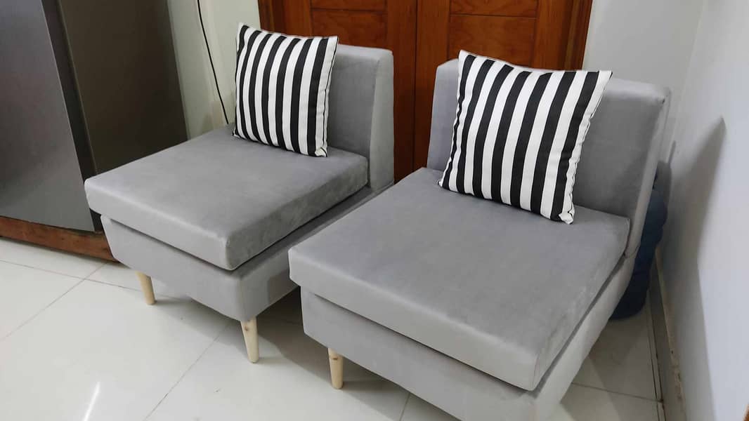 2 single seater  velvet sofa . 2