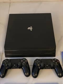 Play Station 4Pro 1 TB ps4 console with 2 controllers and games