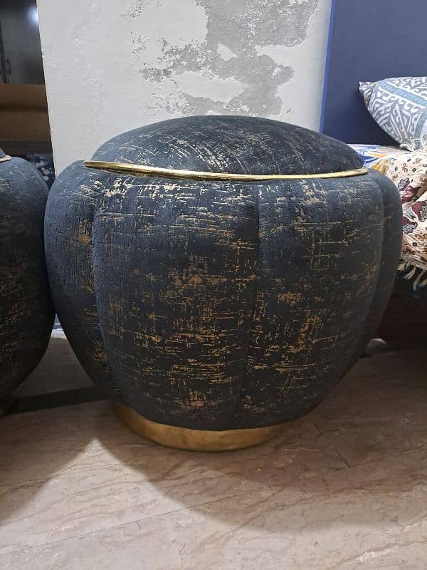 Ottoman in Black and Golden Color 1