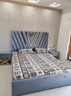 Bed with side tables for sale.