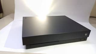 "Xbox One X – 4K Gaming Beast | Great Condition & Best Price!"