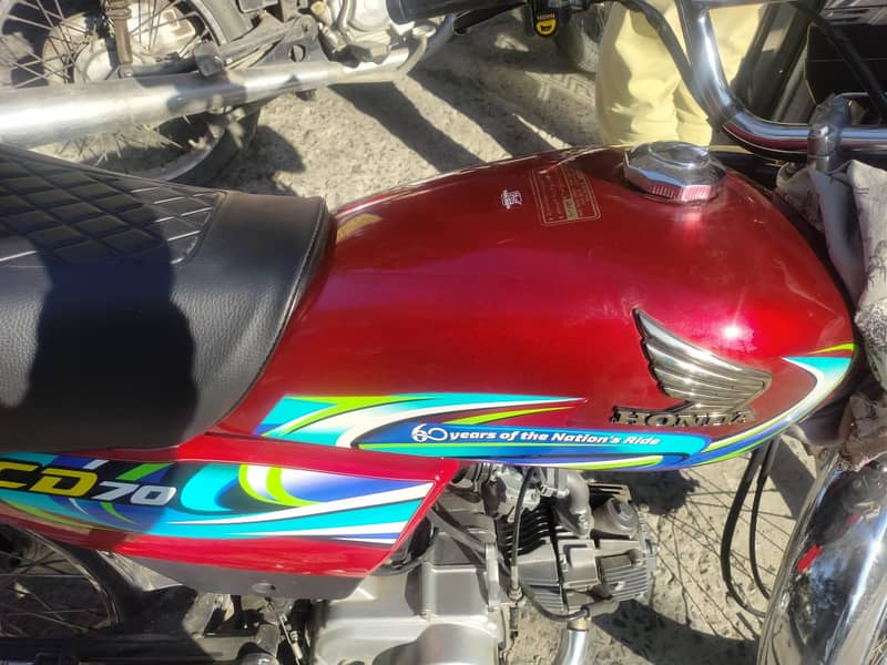 Honda CD 70 2024 6