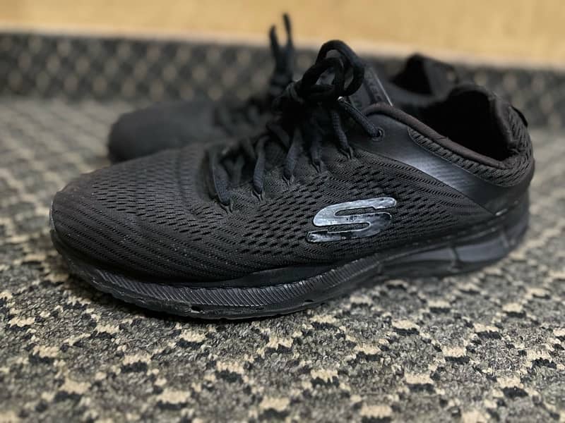 Sketchers Nike shoes 2