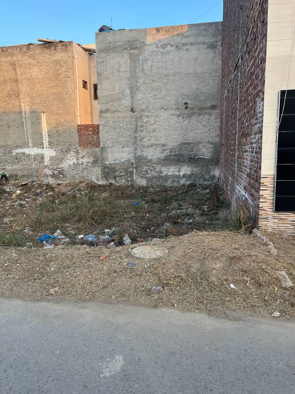 5 Marla facing park plot for sale in Iqbal block Bismillah housing scheme GT Road Lahore 0