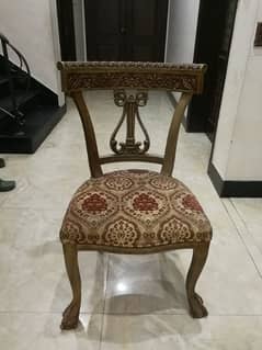 Big dinning table with seven chairs