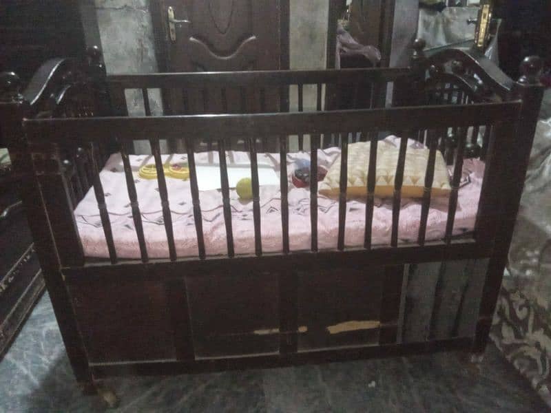 baby bed with draw and with heavy wood work all ok bilkul teak ha. 1