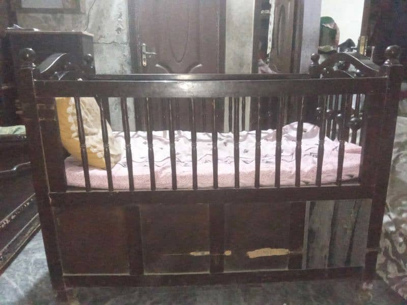 baby bed with draw and with heavy wood work all ok bilkul teak ha. 4