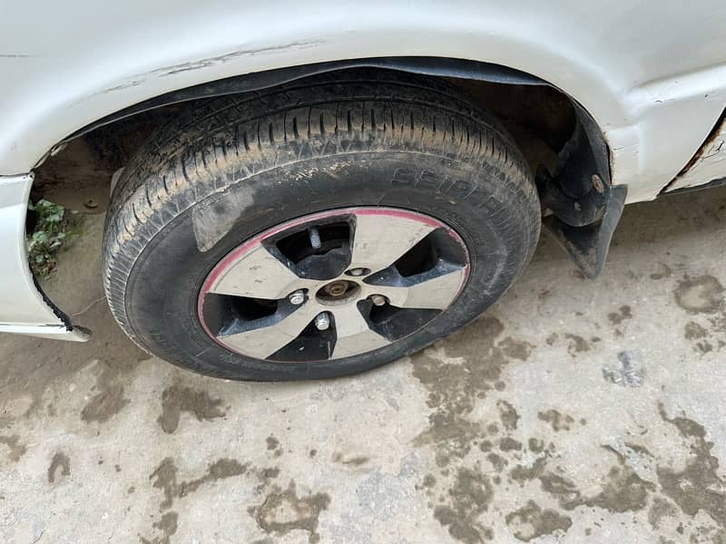 Suzuki Mehran 1998 modify LCD Alloy Rim SINDh NBR . 03.14. 460.50. 60. 19