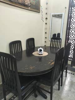 Wooden dining table in good condition needs color