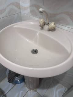 Full size basin with tap in grey colour