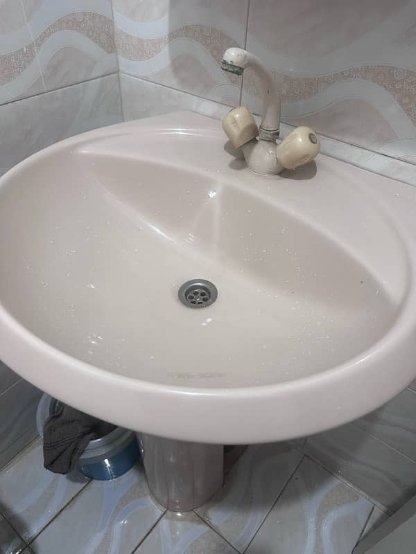 Full size basin with tap in grey colour 0