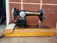 Mercedes sewing machine. . manual with motor added. . . excellent condition