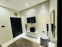 Prime Location 350 Sq Ft Furnished Flat One room attached washroom and open kitchen for Sale in G-1 Block, Johar Town Phase 1 Lahore