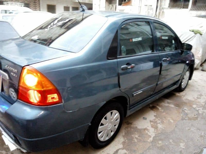 Suzuki Liana APNA ENGINE BLUE COLOR ALMOST ORIGINAL IN MINT CONDITION 10