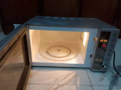 Dawlance microwave oven 2 in 1 grill cooking bhi hote h