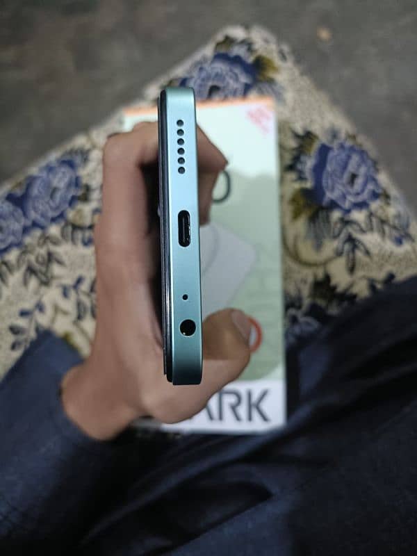 Tecno Spark Go 1 4