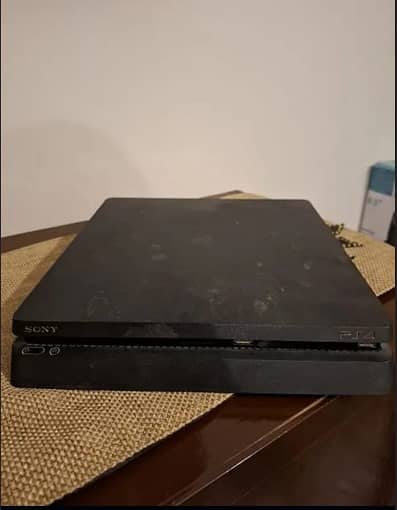 PS 4 Slim Mint condition 2