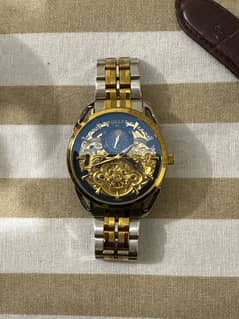 golden auto watch