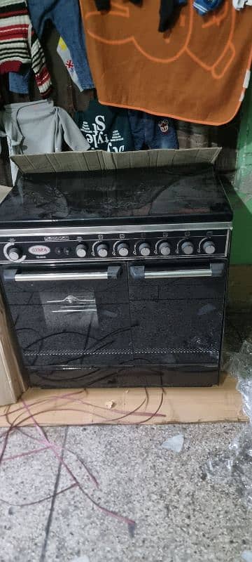 TSLA COOKING RANG 5 BURNER BRND NEW URJNT SALE 1