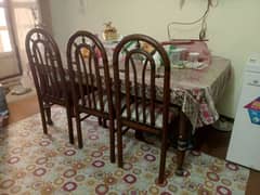 wooden dining table with 6 chairs