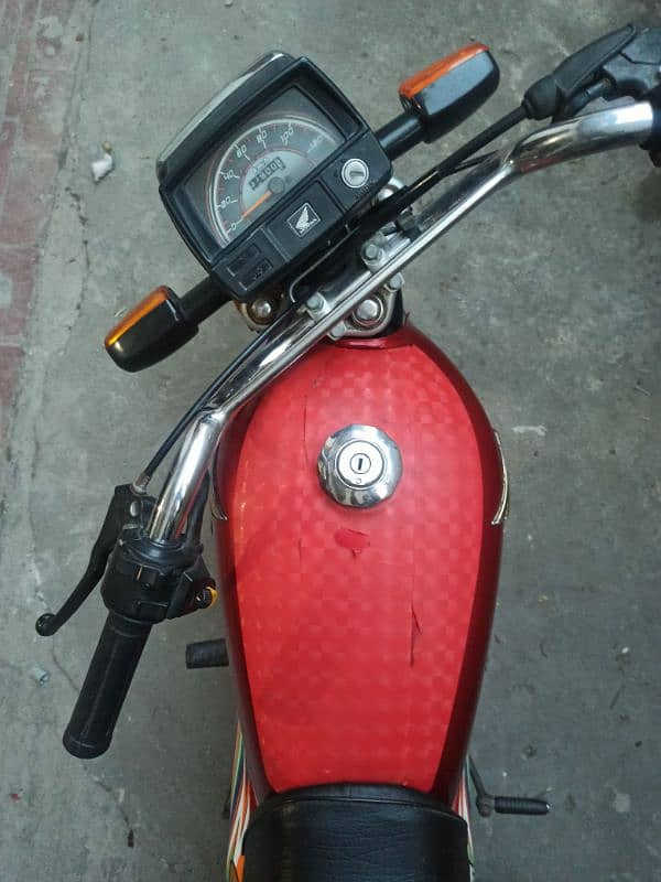 Honda cd 70 red color, one hand home used 12