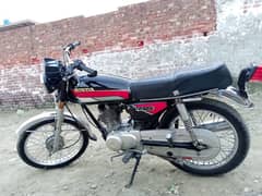 Honda 125 old gold