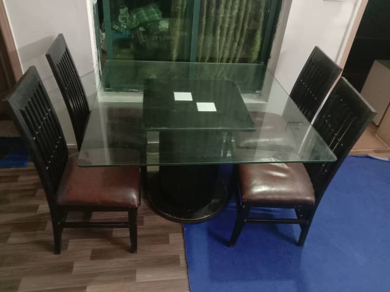 Used dining table with chairs 0