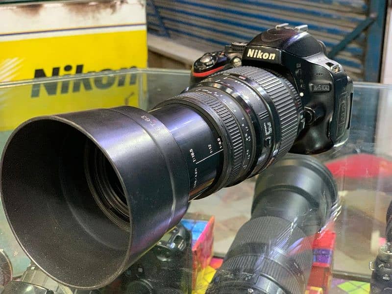 dslr camera naikon d5100 lens 70/300. mm Whatsapp and sim 03212306356 1