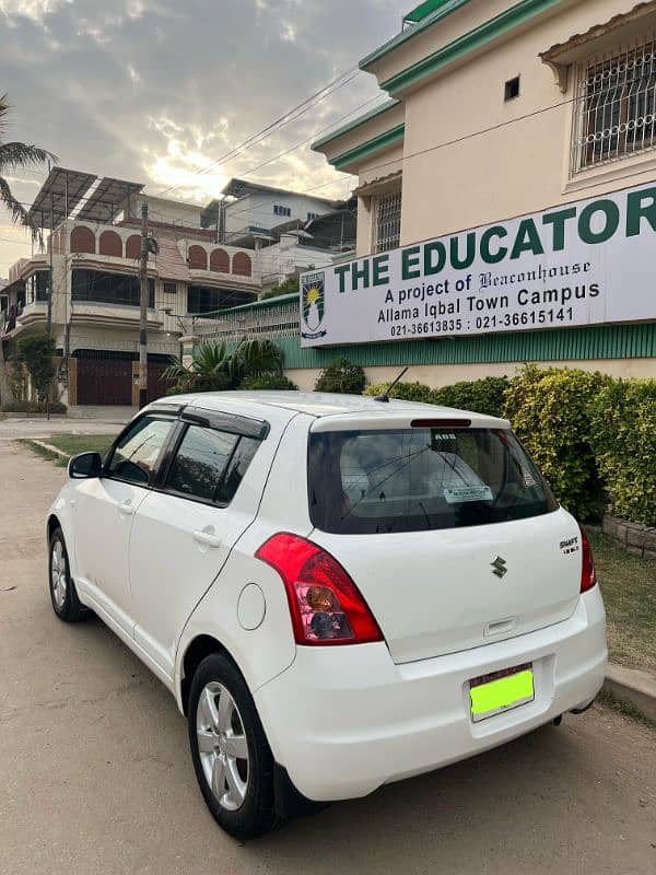 Suzuki Swift DLX model 2017 original white colour 9