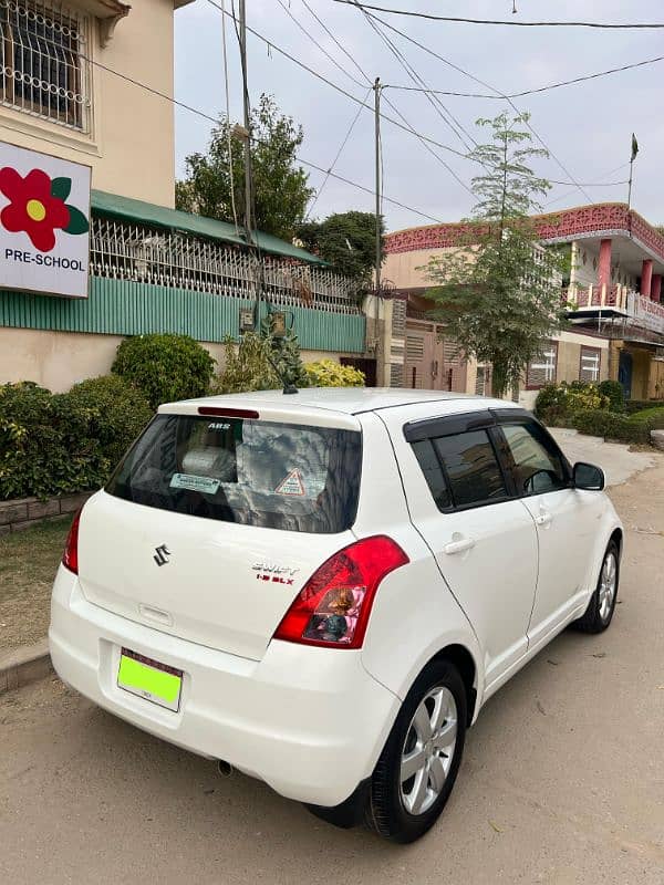 Suzuki Swift DLX model 2017 original white colour 10