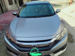 Honda civic 2018 model full option and red meter silver color