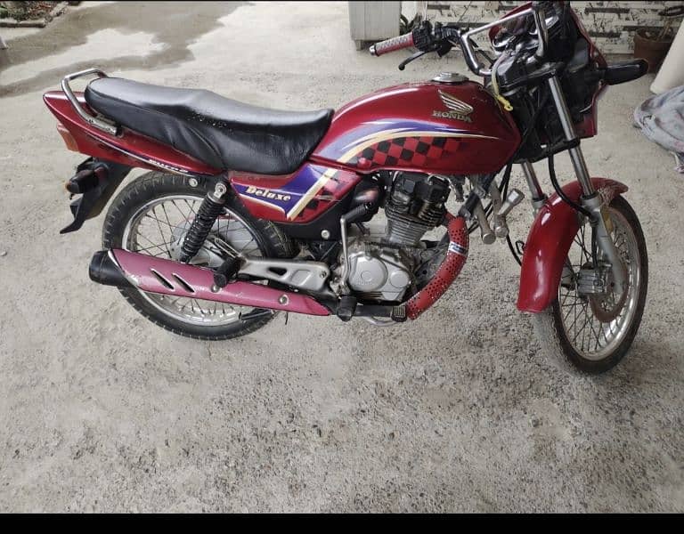 honda 125 deluxe 2011 model mobile no 03342230951 whatsapp also 1