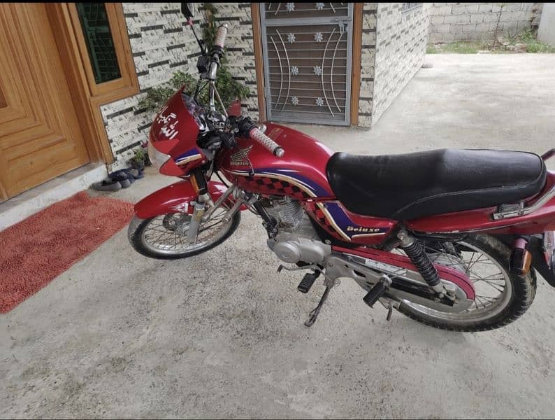 honda 125 deluxe 2011 model mobile no 03342230951 whatsapp also 3