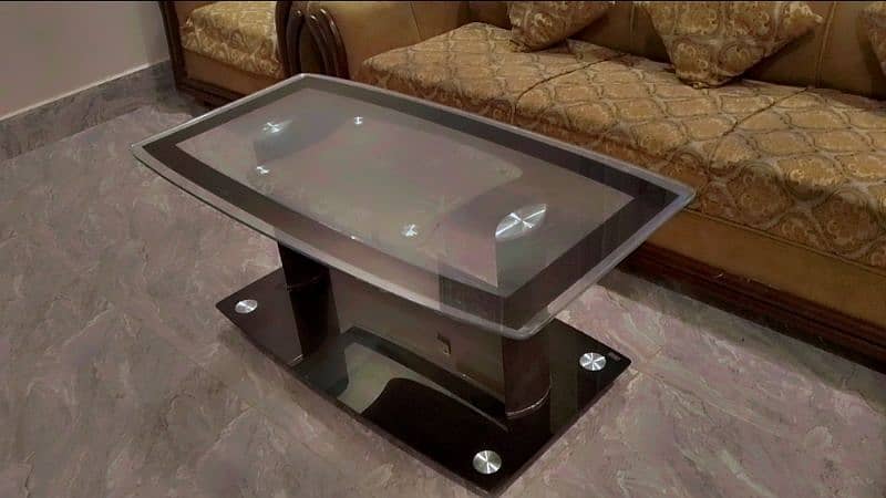 "Modern Glass Center Table - Stylish Living Room Table". 1