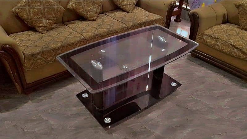 "Modern Glass Center Table - Stylish Living Room Table". 2