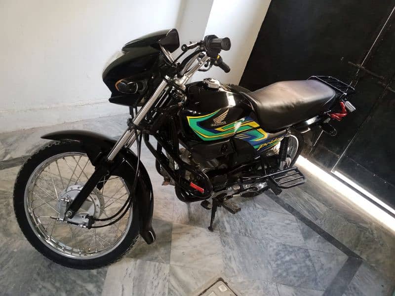 Honda prider 100 cc 12