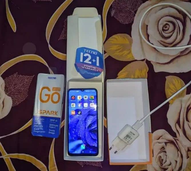 tecno spark go 2023 4+3gb 64gb with box charger 10 by 10 2