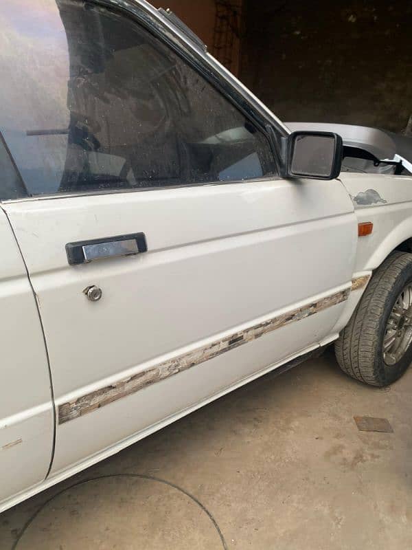 b12 Nissan sunny 86model doors 3